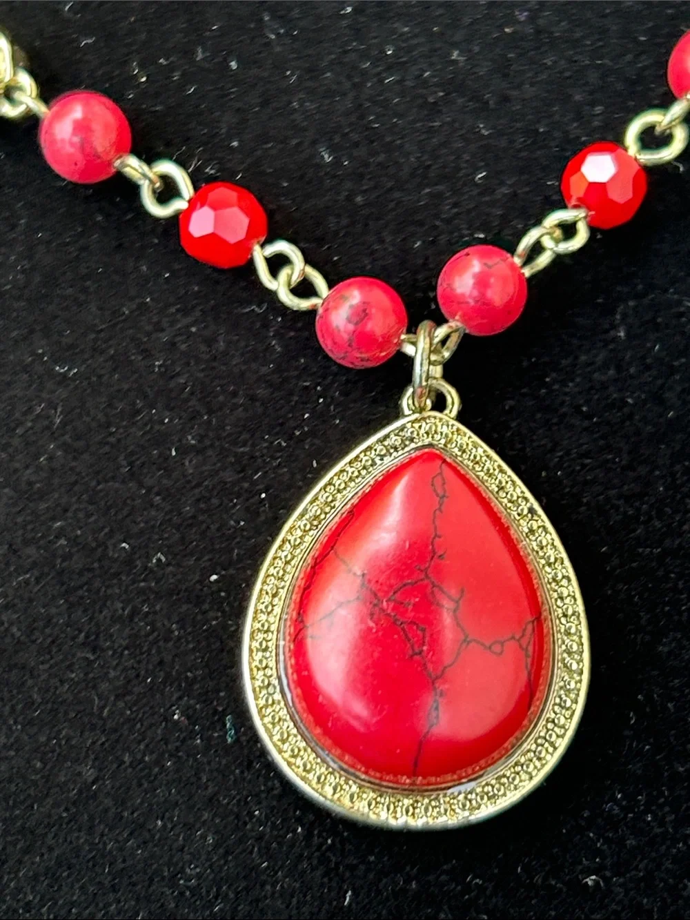 Gold-Tone Necklace with Red Teardrop Pendant